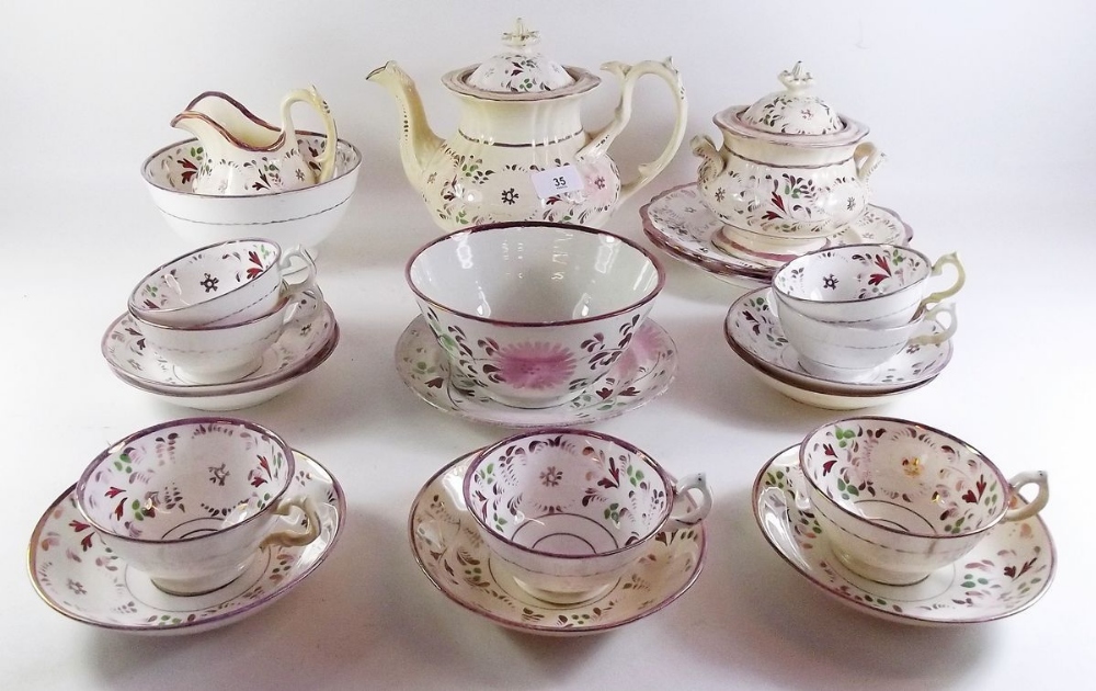 A mid 19th century 'Sunderland' lustre pottery tea service consisting teapot, milk jug, sucrier, two