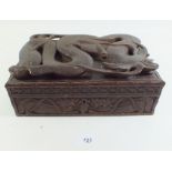 A Chinese wooden box carved dragon to lid - 29cm