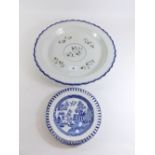 A large pearlware platter painted flowers and a smaller pearlware ribbon plate