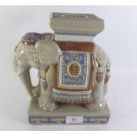 A miniature pottery elephant stand - 23cm tall