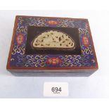 A Chinese cloisonne enamel box with floral and scrollwork decoration and carved jade inset panel