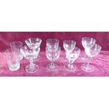 A group of antique drinking glasses including three pairs of wine glasses and five champagne glasses