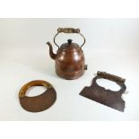 A Victorian copper kettle and two herb choppers