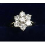 An 18 carat gold large diamond cluster ring, size N 1/2 - approx. 1.5 cts