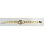 A ladies Omega 9 carat gold watch and strap - total watch weight 22g