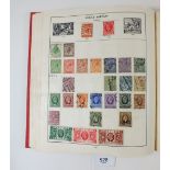 An all world Centurion stamp album and loose stamps with mint and used defin/commem plus loose GB