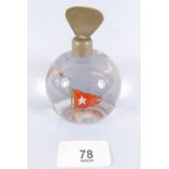 A White Star Line glass paperweight with printed flag motif, chipped to base, 9.5cm tall