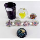 Seven various glass paperweights and a slag glass beaker