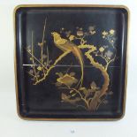 A Japanese lacquer tray with gilt decoration of exotic bird on branch - 41cm wide