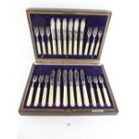 A silver fish cutlery set with twelve place settings and ivory handles, Sheffield 1921, cased