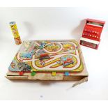 A St Michael's toy till, a kaleidoscope and a painted metal car racing game
