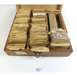 A box of miscellaneous balance staffs for early wristwatches