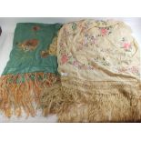 Two Chinese silk embroidered and fringed shawls