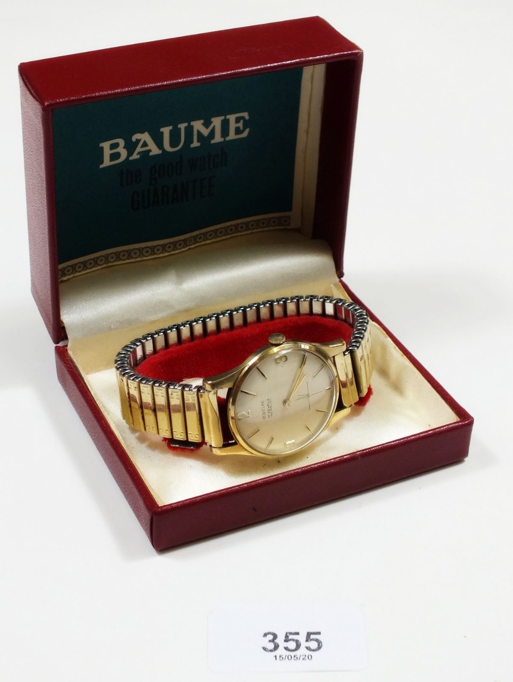 A Baume gold gentleman's wrist watch - boxed