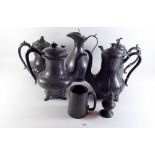 A group of five antique pewter coffee pots and jugs plus a collection of various pewter and silver