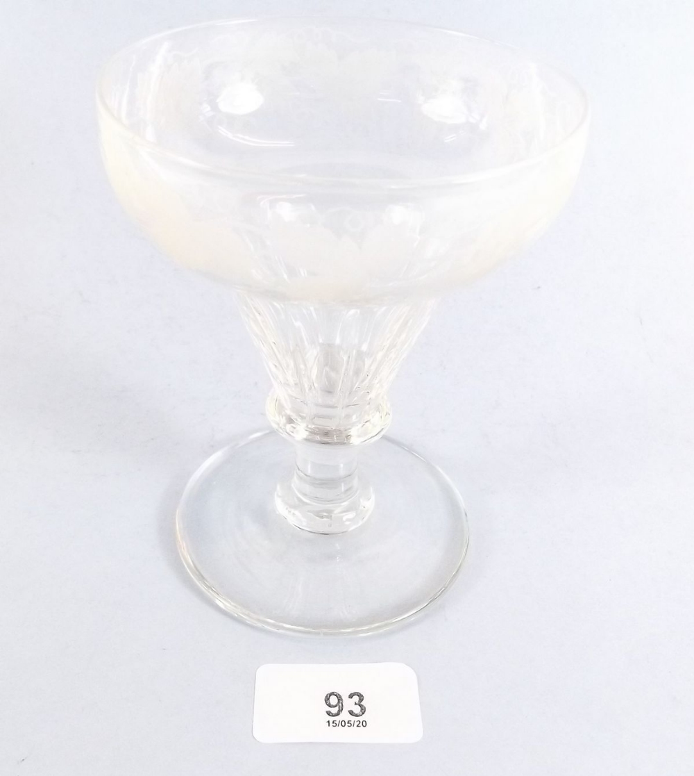 A large 19th century glass goblet engraved vines