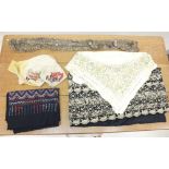 A black and cream oriental embroidered stole, an Arts and Crafts silk embroidered table cloth, a