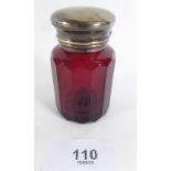 A 19th century ruby cut glass scent bottle with gilt metal lid - 7.2cm