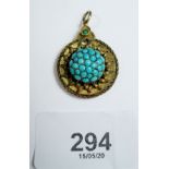 A Victorian gold and turquoise set circular pendant, unmarked, 2.3cm diameter