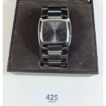 A Gucci 8500m square cased gents wrist watch - stainless steel in original box with paperwork