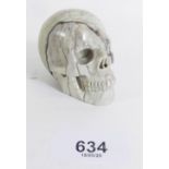 A carved butter jade skull - 5 x 6cm