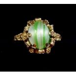 A 9 carat gold ring set green and white stone - size N