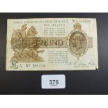 A George V £1 banknote: second Fisher issue February 1923 prefix: P/76 No 388289. Folding, edge