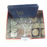An OXO Cube tin containing 24 commemorative coins including: Churchill, Charles and Diana,