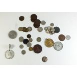 A miscellaneous collection of coinage and medallions including Victoria 1 penny model, German