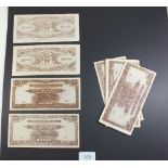 A wad of ninteen Malayan WWII Japanese Government Occupation 100 dollar banknotes, brown, prefix