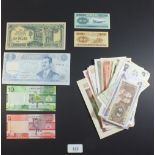 A quantity of approx 65 world banknotes with examples from Argentina, Brazil, British Armed