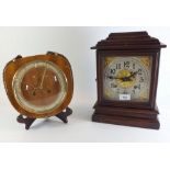 An American Ansonia striking mantel clock with key and pendulum and a 1950's German striking eight