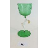 An Italian green bowled glass with nude form stem 14.5cm tall