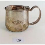 A 'Pullman Carriages' silver plated milk jug by Walker & Hall