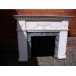 A reproduction Adam style white painted fire surround with faux marble