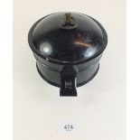 An early 19th century black tin circular spice box, later re finished