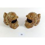A pair of salt glazed stoneware lion spoon rests 10cm tall