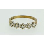 A 9ct gold five stone diamond ring, size M 1/2