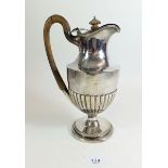 A silver Georgian style water jug, with possible later hallmark London 1991, hinge repaired, 530g