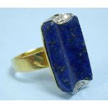 An unusual Art Deco style 18 k gold lapis lazuli and diamond set ring, size L