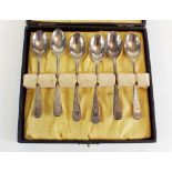 A cased set of six silver spoons- Sheffield 1910