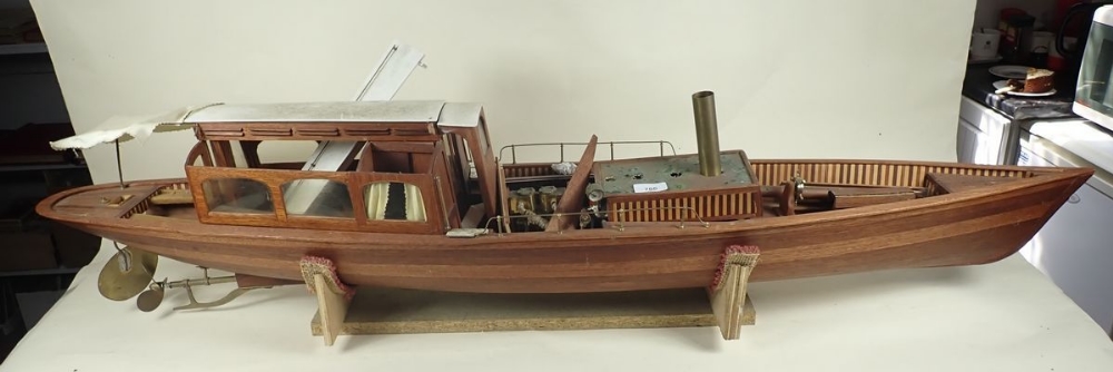 A steam driven built model of a steam boat 128cm long