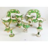 A group of 19th century Rockingham style china painted landscapes on apple green background