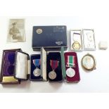 A group of medals including WVS Service Medal, two Royal Commemorative medals 1937 and 1953 (from