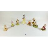 A Royal Doulton Disney Snow White and the Seven Dwarves set (Happy A/F).