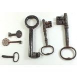 Six antique keys of various sizes.