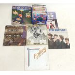 A collection of various single records and albums including The Beatles 'Rock n Roll Music vol 1',