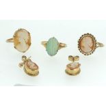 A 9ct gold green stone ring, two 9ct gold cameo rings and a pair of cameo 9 ct gold earrings