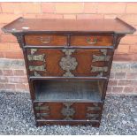 A small Korean hardwood cabinet with brass fittings and locks. 86cm tall.