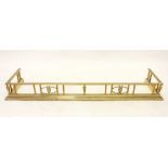 A 19th century brass fireplace fender - 132cm wide